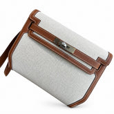 Hermès Kelly Dépêches 25 Ecru Toile Militaire / Fauve Swift Calf Leather Palladium Hardware