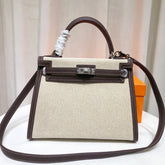 Kelly 25 Bag With Exterior Stitching Crafted Of Patchwork Canvas & Premium Swift Leather, Classic Deep Ebony Wood Shade, Unique Mixed Material Texture With Distinct Vintage Charm Dimensions: Length 25 * Width 10 * Height 18cm