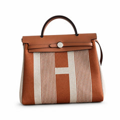 Hermès Herbag Zip 31 Écru Toile H Fauve H Vertical Stripe Print / Fauve Vache Hunter Leather Palladium Hardware