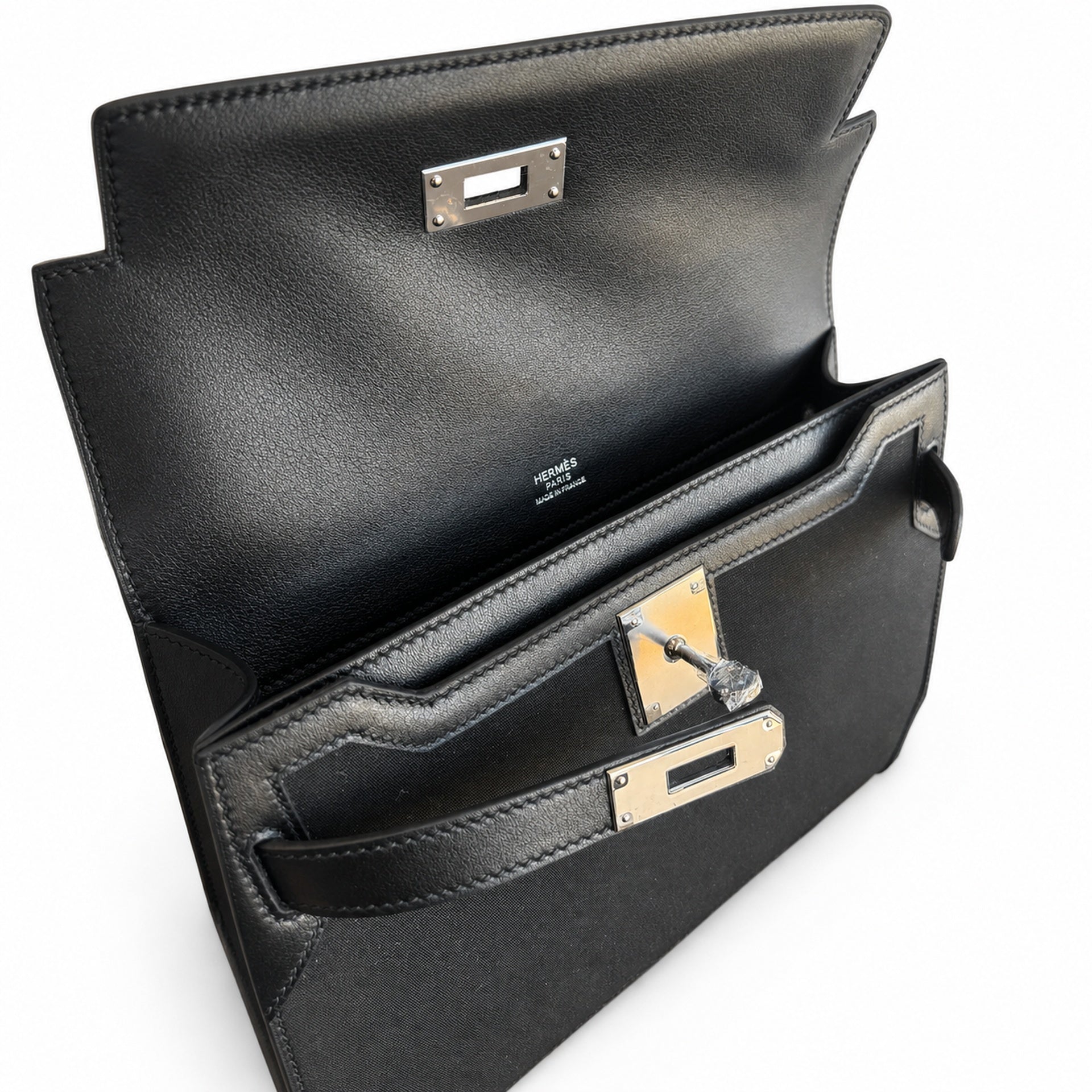 Hermès Kelly Dépêches 25 Noir Toile Militaire / Noir Swift Calf Leather Palladium Hardware